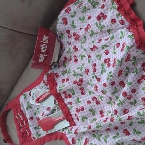 Cute apron with accessories. Made with love. Brighten someone's day.